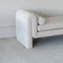 Modern Curved White Upholstered Bench with Bolster Pillows