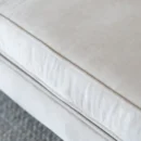 Modern Curved White Upholstered Bench with Bolster Pillows